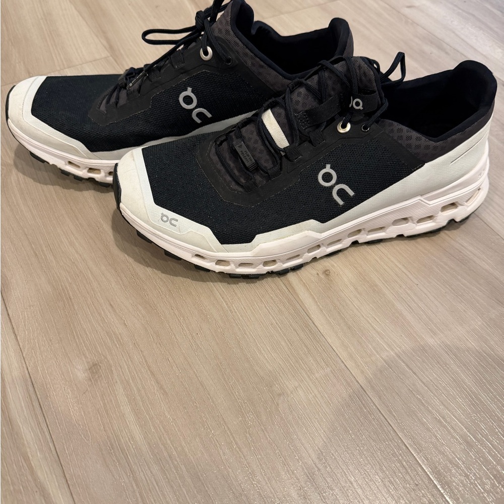 On Running Black and White Athletic Shoes